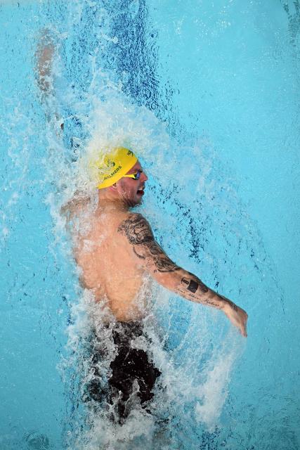 Australia's Kyle Chalmers competes in the Men's 100m Freestyle heats at the swimming event at the Tollcross International Swimming Centre in Glasgow, on day four of the Commonwealth Games in Glasgow, Scotland, on July 27, 2026. (Photo by Oli SCARFF / AFP)