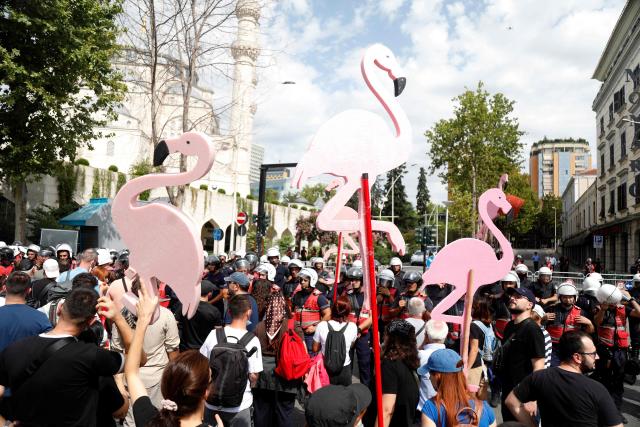 Protesters face police officers during a demonstration outside the parliament as part of a wave of protest against recent decisions of the government in Tirana, on July 27, 2026. Albanian police used force to disperse protesters who had blocked the streets around the Parliament, as a tourism project linked to the Trump family has sparked outrage and as the parliament is expected to approve a 4 million euro ($4.6 million) subsidy for a Kanye West concert. (Photo by AFP)