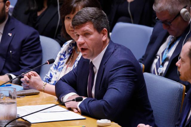 Ukraine’s deputy UN Ambassador Volodymyr Pavlichenko speaks as the United Nations Security Council holds an emergency meeting on the Ukraine-Russia war at UN Headquarters in New York, on July 27, 2026. The emergency session was requested by Ukraine and backed by European members to address recent Russian missile and drone strikes hitting civilian cargo ships and port infrastructure in the Black Sea. (Photo by Leonardo MUNOZ / AFP)
