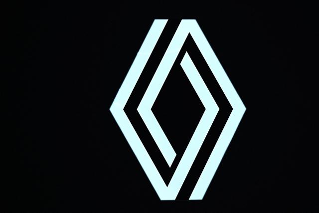 (FILES) This photograph shows the logo of the French company "Renault" displayed at the Paris Motor Show at Paris Expo Porte de Versailles in Paris on October 16, 2024. Renault was referred to a criminal court on charges of aggravated fraud in France's long-running "Dieselgate" emissions scandal, the public prosecutor's office announced via AFP on July 27, 2026. (Photo by JULIEN DE ROSA / AFP)