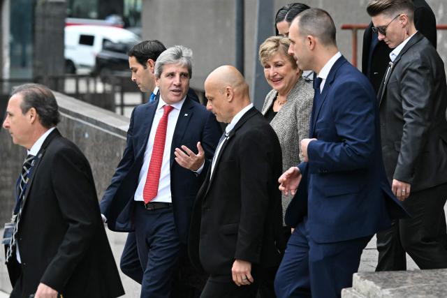International Monetary Fund (IMF) Managing Director Kristalina Georgieva (3-R) leaves Argentina's Economy Ministry in Buenos Aires on July 27, 2026, after a meeting with Argentina's Economy Minister Luis Caputo (2-L) and heads to the Casa Rosada for talks with Argentine President Javier Milei. (Photo by Luis ROBAYO / AFP)