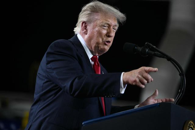 US President Donald Trump delivers remarks at General Motors’ Milford Proving Ground in Milford, Michigan, on July 27, 2026. (Photo by Brendan SMIALOWSKI / AFP)