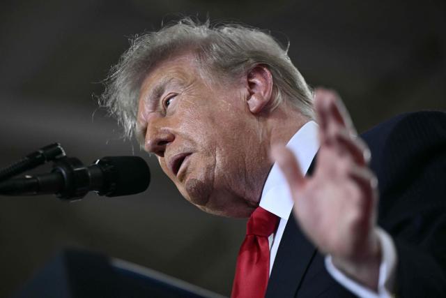 US President Donald Trump delivers remarks at General Motors’ Milford Proving Ground in Milford, Michigan, on July 27, 2026. (Photo by Brendan SMIALOWSKI / AFP)