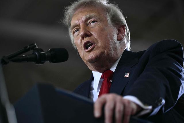 US President Donald Trump delivers remarks at General Motors’ Milford Proving Ground in Milford, Michigan, on July 27, 2026. (Photo by Brendan SMIALOWSKI / AFP)