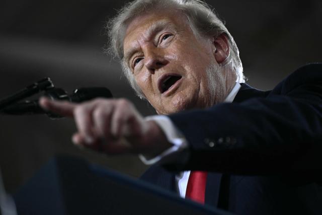 US President Donald Trump delivers remarks at General Motors’ Milford Proving Ground in Milford, Michigan, on July 27, 2026. (Photo by Brendan SMIALOWSKI / AFP)