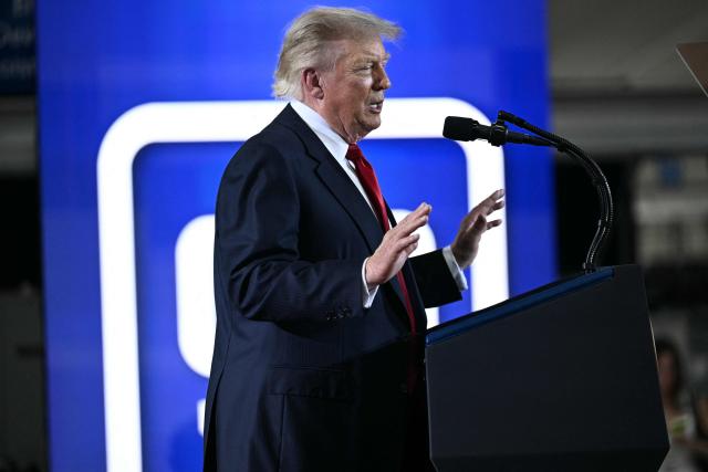 US President Donald Trump delivers remarks at General Motors’ Milford Proving Ground in Milford, Michigan, on July 27, 2026. (Photo by Brendan SMIALOWSKI / AFP)
