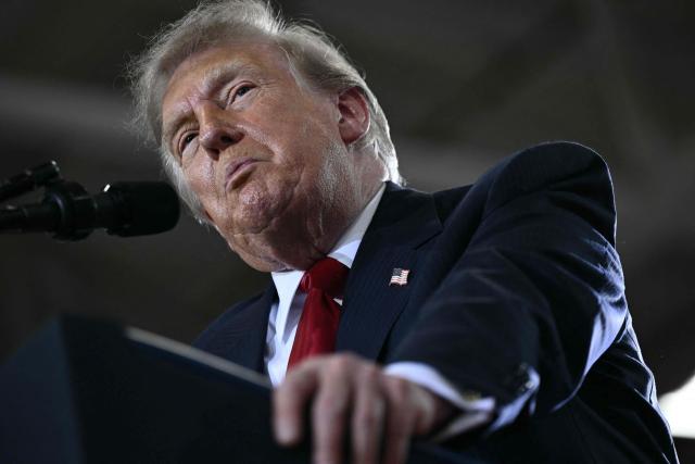 US President Donald Trump delivers remarks at General Motors’ Milford Proving Ground in Milford, Michigan, on July 27, 2026. (Photo by Brendan SMIALOWSKI / AFP)