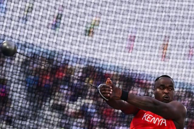 Kenya's Dominic Ongidi Abunda competes in the men's hammer throw final during the athletics event at the Scotstoun Stadium in Glasgow, on day four of the Commonwealth Games in Glasgow, Scotland, on July 27, 2026. (Photo by Ben STANSALL / AFP)