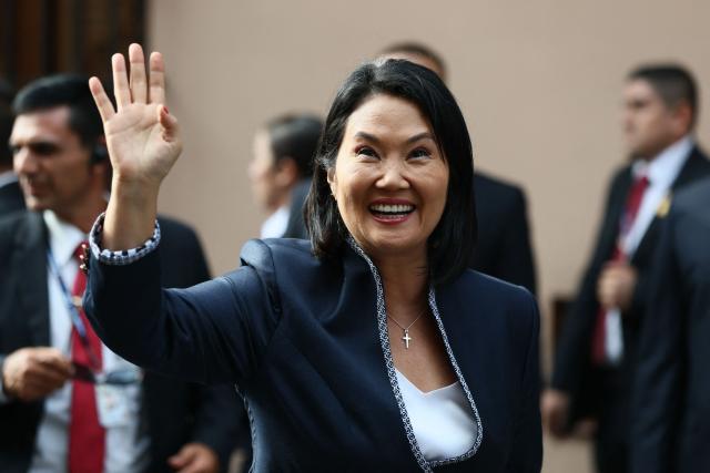 Peru's President-elect Keiko Fujimori waves upon her arrival at the Foreign Ministry for bilateral meetings with foreign delegations ahead of her inauguration in Lima on July 27, 2026. (Photo by Connie FRANCE / AFP)