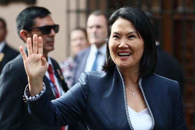 Peru's President-elect Keiko Fujimori waves upon her arrival at the Foreign Ministry for bilateral meetings with foreign delegations ahead of her inauguration in Lima on July 27, 2026. (Photo by Connie FRANCE / AFP)