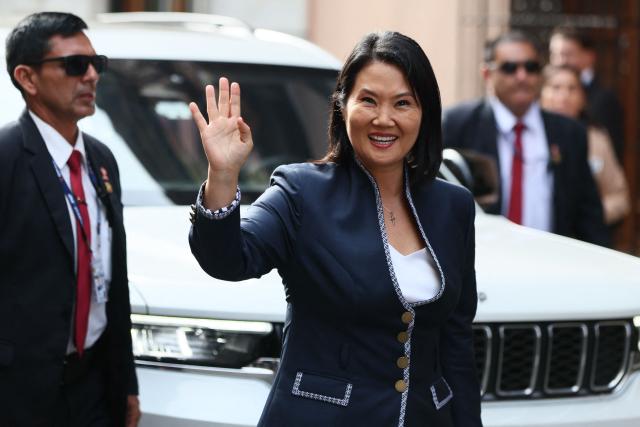 Peru's President-elect Keiko Fujimori waves upon her arrival at the Foreign Ministry for bilateral meetings with foreign delegations ahead of her inauguration in Lima on July 27, 2026. (Photo by Connie FRANCE / AFP)