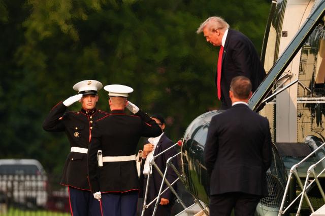 US President Donald Trump steps off Marine One after landing on the Ellipse near the White House in Washington, DC, on July 27, 2026. Trump is returning from Milford, Michigan where he visited General Motors' vehicle testing site Milford Proving Ground. (Photo by Aaron Schwartz / AFP)