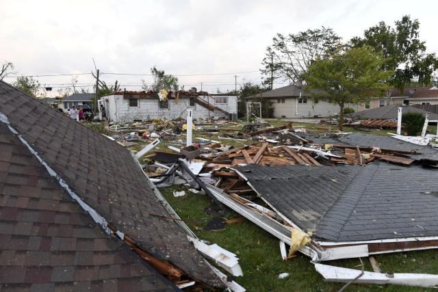 Damaged houses are seen after a tornado ripped through parts of Wisconsin in Menasha, Wisconsin, on July 27, 2026. (Photo by Octavio JONES / AFP)