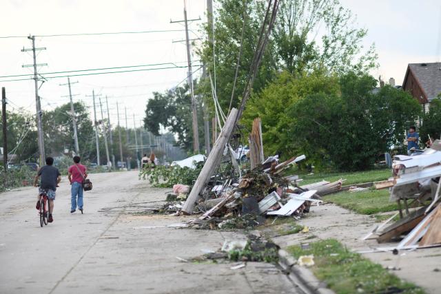 Debris litters the street after a tornado ripped through parts of Wisconsin in Menasha, Wisconsin, on July 27, 2026. (Photo by OCTAVIO JONES / AFP)