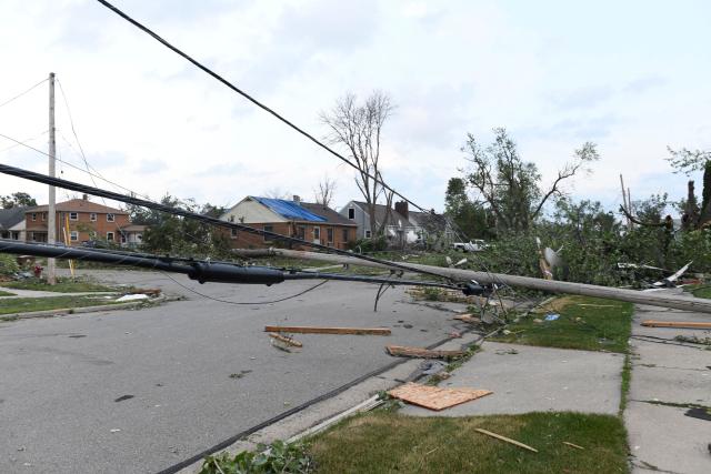 Debris litters the street after a tornado ripped through parts of Wisconsin in Menasha, Wisconsin, on July 27, 2026. (Photo by OCTAVIO JONES / AFP)