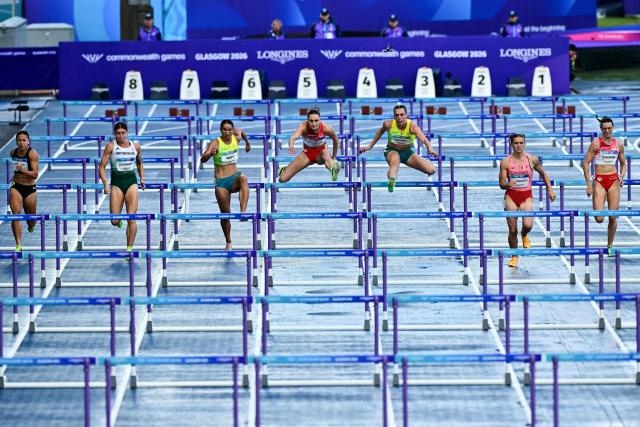 (From L) New Zealand's Briana Stephenson, Northern Ireland's Katherine O'Connor, Australia's Tori West, England's Niamh Emerson, Australia's Mia Scerri, Canada's Sienna MacDonald, England's Jade O'Dowda and Gibraltar's Ella Rush compete in the women's heptathlon 100m hurdles heat 1 during the athletics event at the Scotstoun Stadium in Glasgow, on day five of the Commonwealth Games in Glasgow, Scotland, on July 28, 2026. (Photo by Ben STANSALL / AFP)