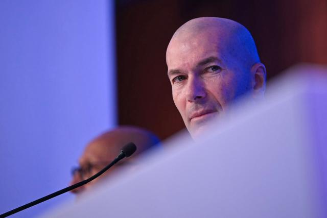Former French international football player Zinedine Zidane speaks during a press conference to present him as the new head coach of France national football team at the French Football Federation headquarters (FFF) in Paris on July 28, 2026. The former France playmaker, who won the 1998 World Cup and the 2000 European Championship as a player, has been appointed head coach of the French national team, succeeding Didier Deschamps, the French Football Federation (FFF) announced. Zidane takes over from his former teammate Deschamps, who had been in charge since 2012; Deschamps' tenure ended with a fourth-place finish at the 2026 World Cup, following a title win in 2018 and a final appearance in 2022. (Photo by LOU BENOIST / AFP)