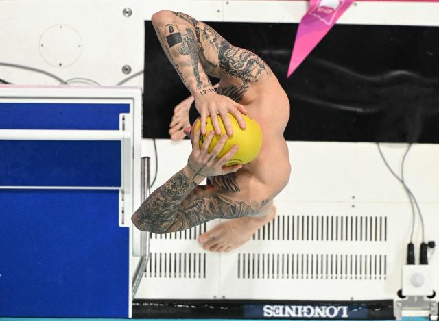 Australia's Kyle Chalmers prepares fir the  in the Men's 50m Butterfly - Heats at the swimming event at the Tollcross International Swimming Centre in Glasgow, on day five of the Commonwealth Games in Glasgow, Scotland, on July 28, 2026. (Photo by Oli SCARFF / AFP)