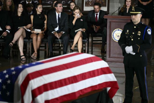 US Senator Darline Graham (C) attends a Congressional tribute to late US Senator Lindsey Graham in the Rotunda of the US Capitol in Washington, DC, on July 28, 2026. Graham, a South Carolina Republican and key Trump ally who was elected to the Senate four times, died at age 71 on July 11. (Photo by Brendan SMIALOWSKI / AFP)