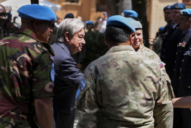 United Nations Secretary-General Antonio Guterres attends a wreath-laying ceremony at the Ledra Palace Hotel in the UN-controlled buffer zone in the divided capital of Nicosia, Cyprus, on July 28, 2026. United Nations chief Antonio Guterres said he held two "very constructive" separate meetings with rival Cypriot leaders on July 28, ahead of a trilateral meeting to weigh the prospect of fresh negotiations nine years after the peace process collapsed. (Photo by Petros Karadjias / POOL / AFP)