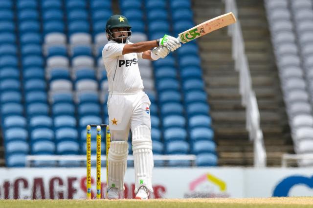 Babar Azam of Pakistan hits 4 during the fourth day of the first Test cricket match between West Indies and Pakistan at the Brian Lara Cricket Academy in Tarouba, Trinidad and Tobago, on July 28, 2026. (Photo by Randy Brooks / AFP)