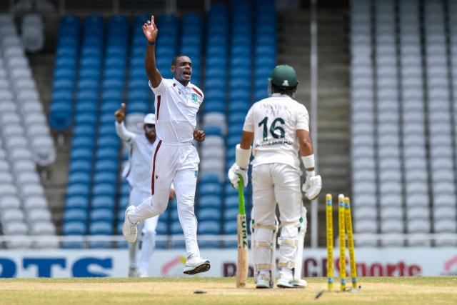 Justin Greaves (L) of West Indies celebrates the dismissal of Mohammad Rizwan (R) of Pakistan during the fourth day of the first Test cricket match between West Indies and Pakistan at the Brian Lara Cricket Academy in Tarouba, Trinidad and Tobago, on July 28, 2026. (Photo by Randy Brooks / AFP)
