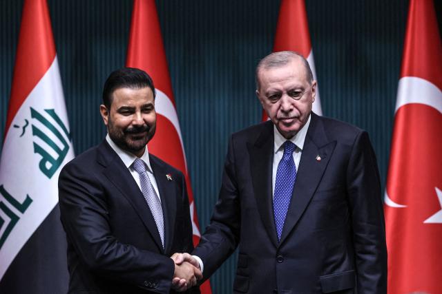 Turkish President Recep Tayyip Erdogan (R) shakes hand with Iraqi Prime Minister Ali al-Zaydi (L) after a joint press conference at the Presidential Complex in Ankara, on July 28, 2026. (Photo by Adem ALTAN / AFP)