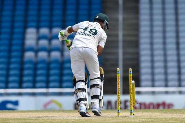 Khurram Shahzad of Pakistan is bowled by Jayden Seales of West Indies during the fourth day of the first Test cricket match between West Indies and Pakistan at the Brian Lara Cricket Academy in Tarouba, Trinidad and Tobago, on July 28, 2026. (Photo by Randy Brooks / AFP)