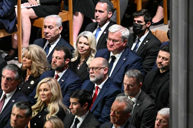 Israli Prime Minister Benjamin Netanyahu (upper L) and Ukrainian President Volodymyr Zelensky (R) attend the funeral service for US Senator Lindsey Graham at the Washington National Cathedral in Washington, DC, on July 28, 2026. Graham, a South Carolina Republican and key Trump ally who was elected to the Senate four times, died at age 71 on July 11. (Photo by Alex WROBLEWSKI / AFP)