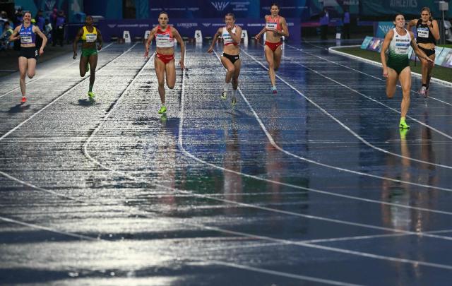 (From L) Scotland's Allie Routledge, Cameroon's Adele Mafogang Tenkeu, England's Niamh Emerson, Jersey's Lucy Woodward, Canada's Hannah Blair, Northern Ireland's Katherine O'Connor and New Zealand's Maddie Wilson compete in the women's heptathlon 200m during the athletics event at the Scotstoun Stadium in Glasgow, on day five of the Commonwealth Games in Glasgow, Scotland, on July 28, 2026. (Photo by ANDY BUCHANAN / AFP)