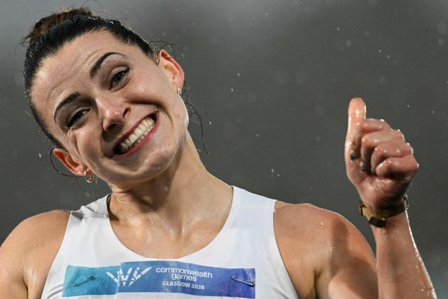 Northern Ireland's Anna McCauley celebrates after arriving first in the women's heptathlon 200m heat 2 during the athletics event at the Scotstoun Stadium in Glasgow, on day five of the Commonwealth Games in Glasgow, Scotland, on July 28, 2026. (Photo by ANDY BUCHANAN / AFP)