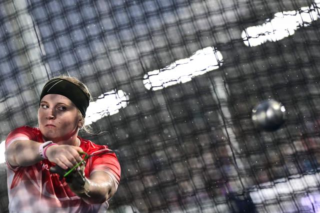 England's Charlotte Payne competes in the women's hammer throw final during the athletics event at the Scotstoun Stadium in Glasgow, on day five of the Commonwealth Games in Glasgow, Scotland, on July 28, 2026. (Photo by Ben STANSALL / AFP)