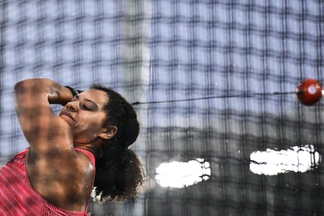 Canada's Camryn Rogers competes in the women's hammer throw final during the athletics event at the Scotstoun Stadium in Glasgow, on day five of the Commonwealth Games in Glasgow, Scotland, on July 28, 2026. (Photo by Ben STANSALL / AFP)