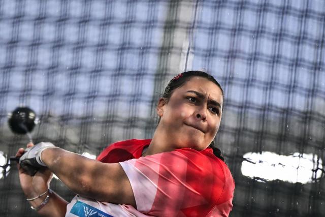 England's Tara Simpson-Sullivan competes in the women's hammer throw final during the athletics event at the Scotstoun Stadium in Glasgow, on day five of the Commonwealth Games in Glasgow, Scotland, on July 28, 2026. (Photo by Ben STANSALL / AFP)