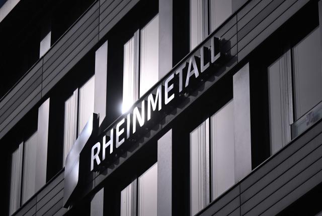 (FILES) The logo of German weapons producer and automotive supplier Rheinmetall is seen at the company's headquarters during the annual results press conference in Duesseldorf, western Germany, on March 14, 2024. German armsmaker Rheinmetall on July 29, 2026 reported record second-quarter core profit and beat expectations, sending shares in the firm up almost 9 percent. (Photo by Ina FASSBENDER / AFP)