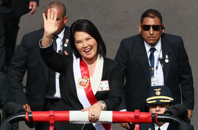 Peru's President Keiko Fujimori waves to supporters during a military parade to celebrate Peru's National Holidays, in Lima on July 29, 2026. (Photo by Connie FRANCE / AFP)