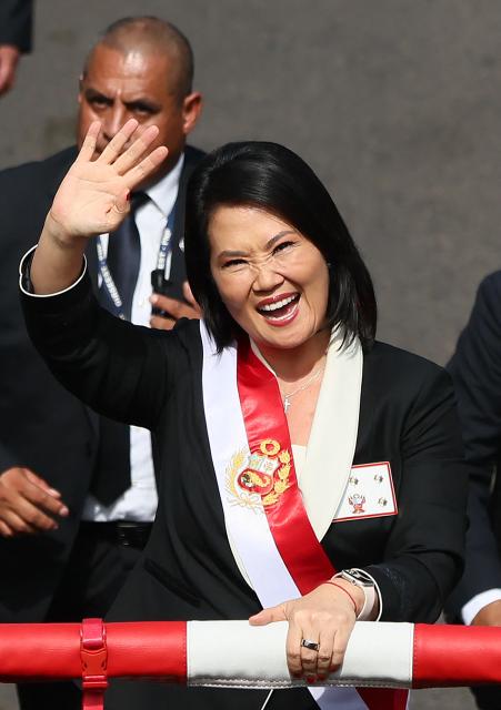 Peru's President Keiko Fujimori waves to supporters during a military parade to celebrate Peru's National Holidays, in Lima on July 29, 2026. (Photo by Connie FRANCE / AFP)