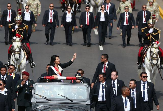 Peru's President Keiko Fujimori waves to supporters during a military parade to celebrate Peru's National Holidays, in Lima on July 29, 2026. (Photo by Connie FRANCE / AFP)