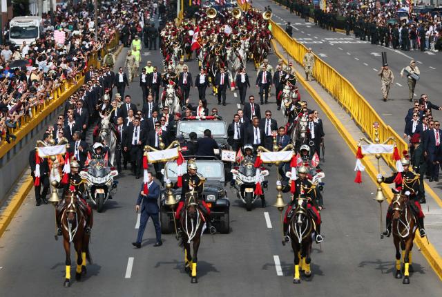 Peru's President Keiko Fujimori waves to supporters during a military parade to celebrate Peru's National Holidays, in Lima on July 29, 2026. (Photo by Connie FRANCE / AFP)