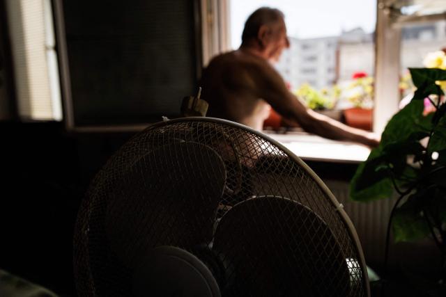 A fan is seen in an apartment at Place des Fêtes during a hot summer day in Paris on July 29, 2026. The retired couple say their home turns into a "thermal kettle" during heatwaves, becoming unbearably hot. Western Europe this year experienced its hottest June on record as a searing heatwave swept across a continent facing increasingly frequent and intense heat extremes, the EU's climate monitor said on July 9, 2026. (Photo by Simon WOHLFAHRT / AFP)