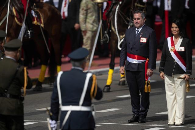 Peru's President Keiko Fujimori and her Defense Minister Rafael Belaunde receive military honors during a military parade to celebrate Peru's National Holidays, in Lima on July 29, 2026. (Photo by ERNESTO BENAVIDES / AFP)
