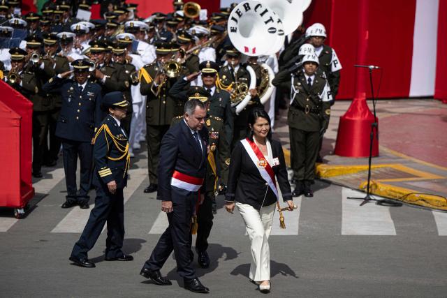 Peru's President Keiko Fujimori and her Defense Minister Rafael Belaunde inspect the troops during a military parade to celebrate Peru's National Holidays, in Lima on July 29, 2026. (Photo by ERNESTO BENAVIDES / AFP)