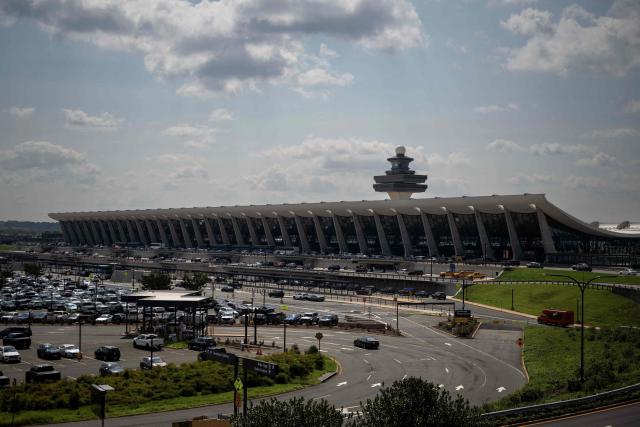 The main terminal of Dulles International Airport (IAD) is seen in Dulles, Virginia, on July 29, 2026. US President Donald Trump is set to unveil a $20 billion plan to rebuild and renovate Washington Dulles International Airport. (Photo by Kent Nishimura / AFP)
