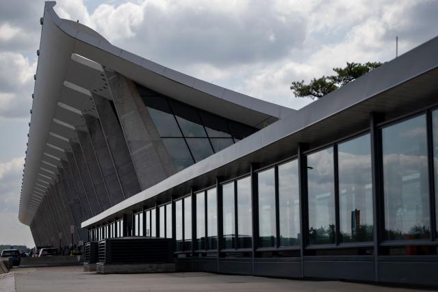 The main terminal of Dulles International Airport (IAD) is seen in Dulles, Virginia, on July 29, 2026. US President Donald Trump is set to unveil a $20 billion plan to rebuild and renovate Washington Dulles International Airport. (Photo by Kent Nishimura / AFP)