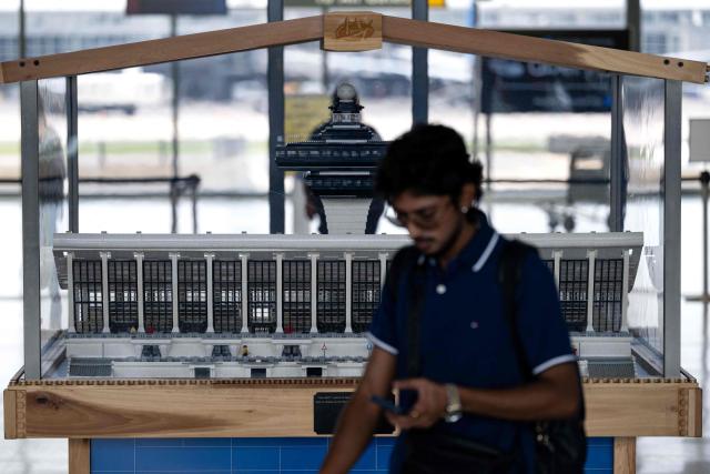 A lego replica of the Dulles International Airport main terminal is displayed at Dulles International Airport in Dulles, Virginia, on July 29, 2026. US President Donald Trump is set to unveil on Wednesday a $20 billion plan to rebuild and renovate Washington Dulles International Airport. (Photo by Kent Nishimura / AFP)