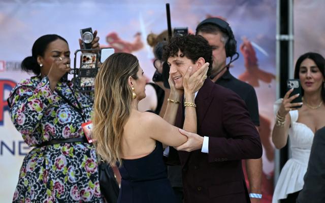 US actor Marisa Tomei (L) greets US actor Tom Holland upon arrival to attend the UK Premiere for 'Spider-Man: Brand New Day UK' at the Odeon Luxe Leicester Square in central London on July 29, 2026. (Photo by JUSTIN TALLIS / AFP)