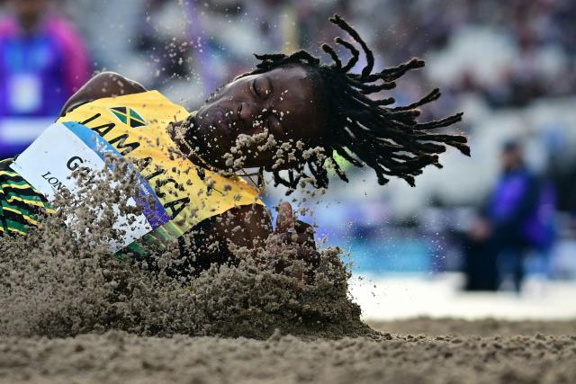 Jamaica's Tajay Gayle competes in the men's long jump final during the athletics event at the Scotstoun Stadium in Glasgow, on day six of the Commonwealth Games in Glasgow, Scotland, on July 29, 2026. (Photo by Ben STANSALL / AFP)