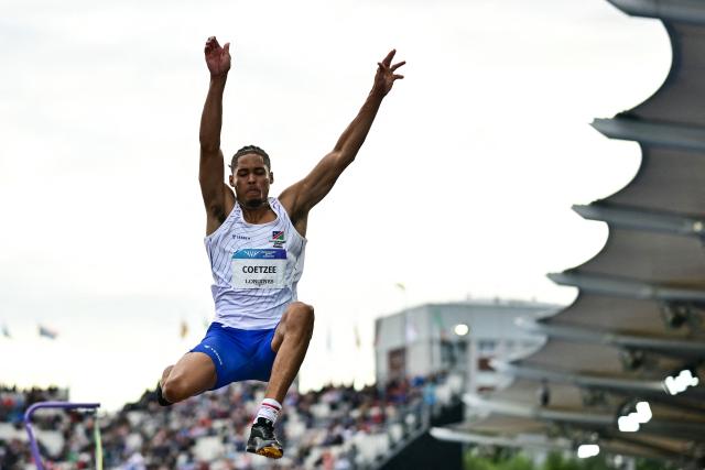 Namibia's Chenoult Lionel Coetzee competes in the men's long jump final during the athletics event at the Scotstoun Stadium in Glasgow, on day six of the Commonwealth Games in Glasgow, Scotland, on July 29, 2026. (Photo by Ben STANSALL / AFP)
