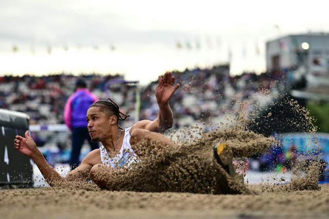 Namibia's Chenoult Lionel Coetzee competes in the men's long jump final during the athletics event at the Scotstoun Stadium in Glasgow, on day six of the Commonwealth Games in Glasgow, Scotland, on July 29, 2026. (Photo by Ben STANSALL / AFP)