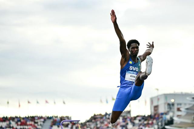 Saint Vincent and the Grenadines' Uroy Ryan competes in the men's long jump final during the athletics event at the Scotstoun Stadium in Glasgow, on day six of the Commonwealth Games in Glasgow, Scotland, on July 29, 2026. (Photo by Ben STANSALL / AFP)